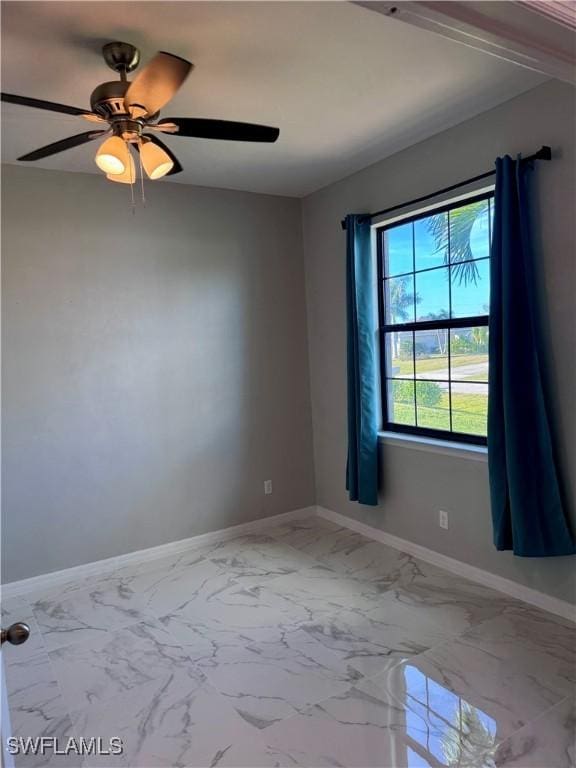 empty room with ceiling fan