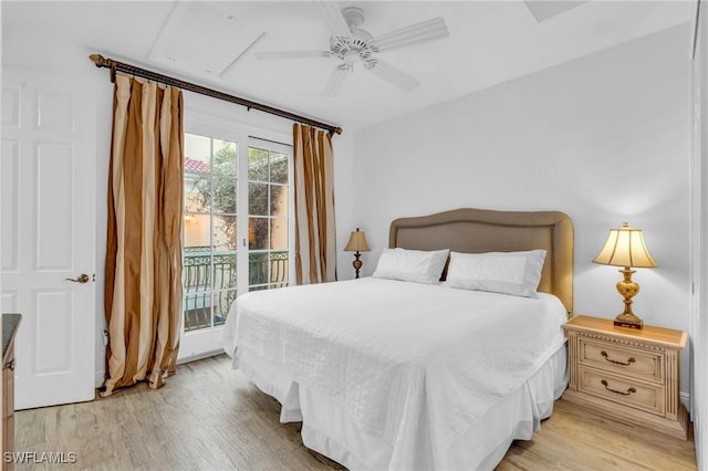 bedroom with access to outside, ceiling fan, and light hardwood / wood-style floors