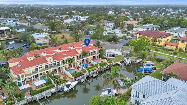 bird's eye view with a water view