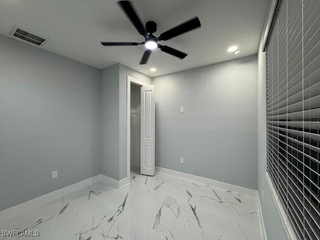 unfurnished bedroom with ceiling fan