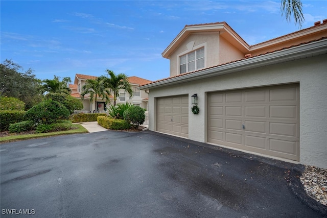 exterior space with a garage