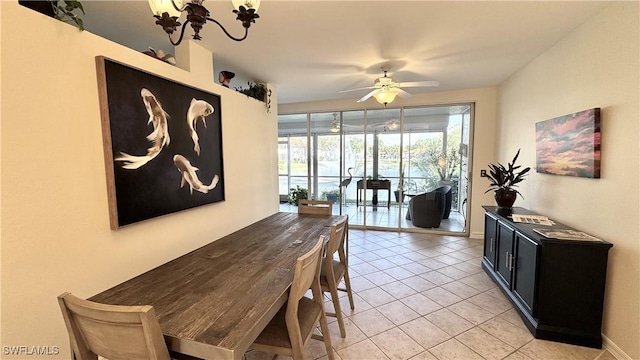 dining room with ceiling fan and light tile patterned floors