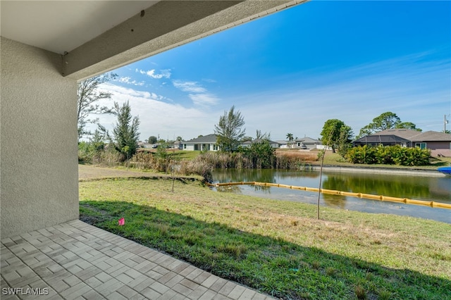 view of yard with a water view