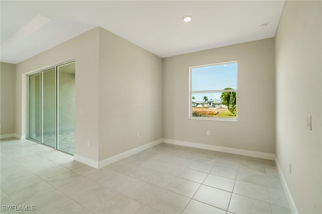 view of tiled spare room