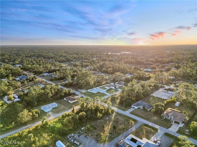 3306 E 7th St, Lehigh Acres, FL 33972 - aerial overview of property's location featuring nearby suburban area