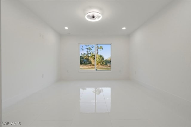 spare room with tile patterned flooring