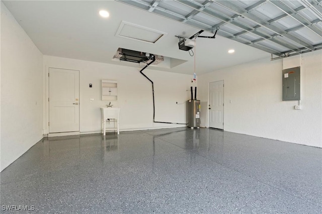 3306 E 7th St, Lehigh Acres, FL 33972 - garage featuring electric panel, electric water heater, a garage door opener, and recessed lighting