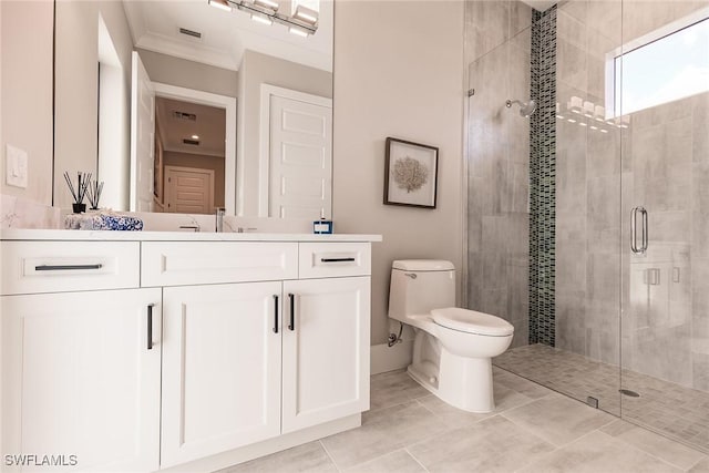 bathroom with tile patterned flooring, vanity, an enclosed shower, and toilet