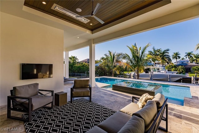 view of patio / terrace with outdoor lounge area and ceiling fan