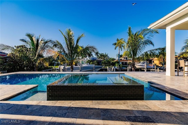 view of pool with a patio area