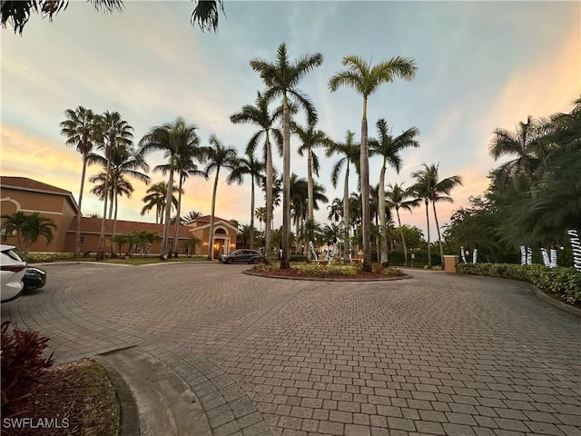1275 Wildwood Lakes Blvd Unit 105, Naples, FL 34104 - view of road with curbs
