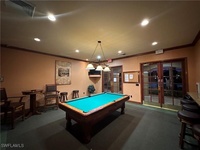 game room with dark carpet, crown molding, pool table, and french doors