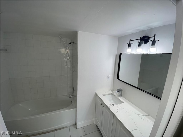 1275 Wildwood Lakes Blvd Unit 105, Naples, FL 34104 - bathroom featuring baseboards, bathtub / shower combination, tile patterned floors, and vanity