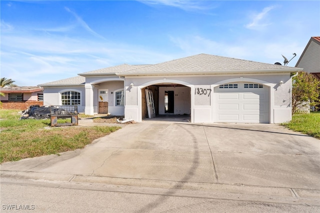 view of front of home featuring a garage