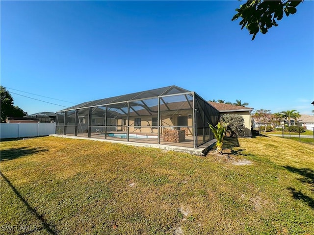 view of yard with a fenced in pool and a patio