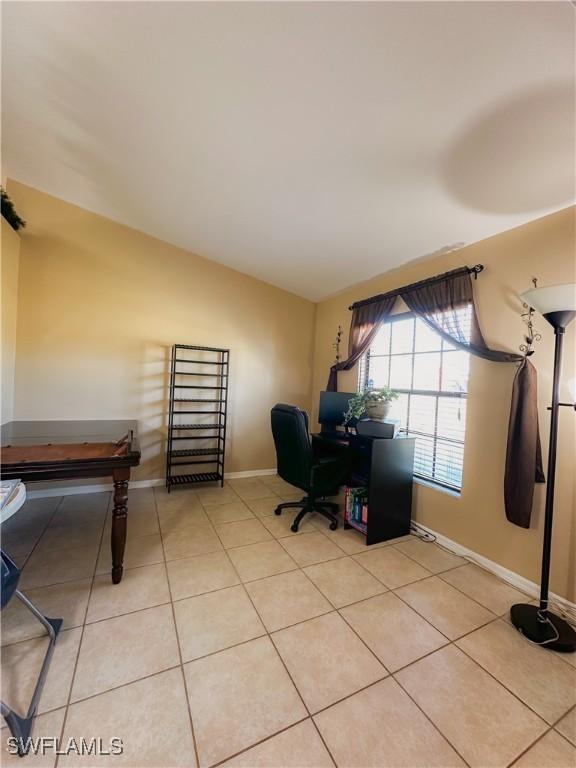 home office featuring light tile patterned floors