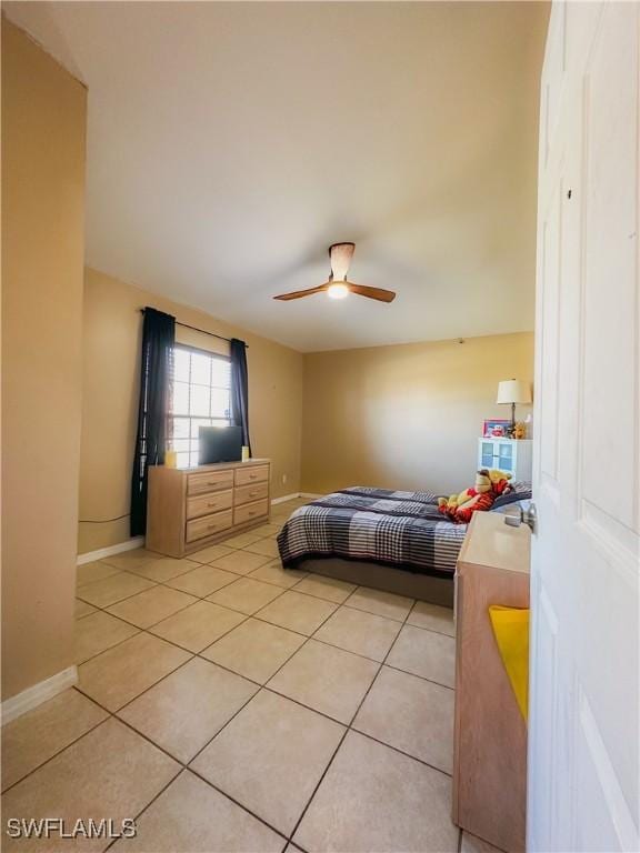 bedroom featuring ceiling fan and light tile patterned floors