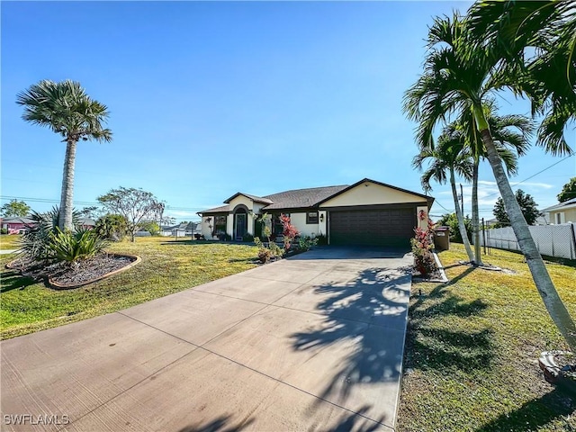 single story home with a front lawn and a garage