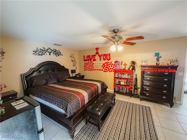 bedroom featuring ceiling fan and light tile patterned floors