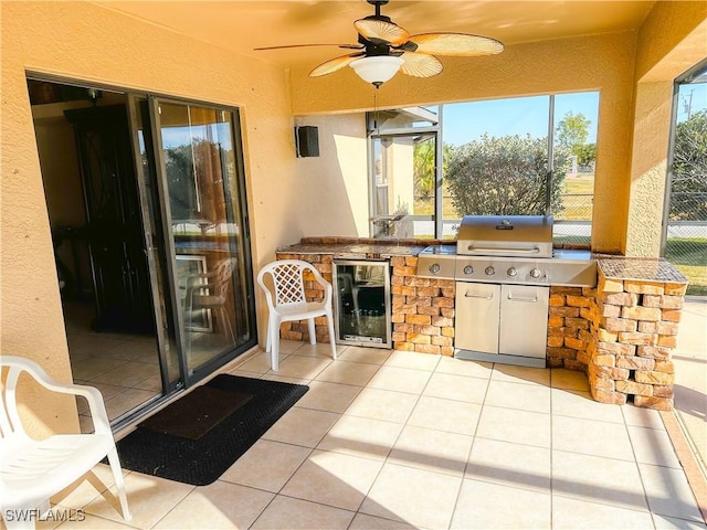 view of patio / terrace featuring ceiling fan, area for grilling, and grilling area