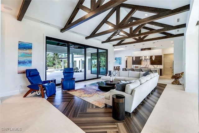 living room featuring beam ceiling, dark parquet floors, and high vaulted ceiling