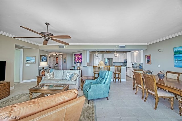 tiled living room featuring ceiling fan and ornamental molding