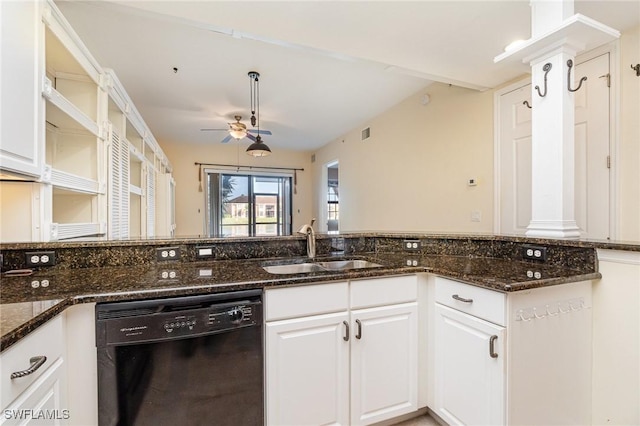 kitchen with ceiling fan, sink, dark stone countertops, black dishwasher, and white cabinetry