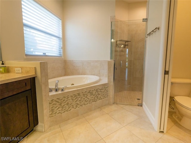 full bathroom with plus walk in shower, tile patterned flooring, vanity, and toilet