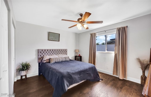 bedroom featuring dark wood-type flooring and ceiling fan