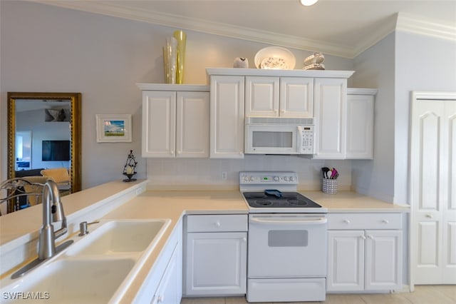 kitchen featuring sink, white cabinets, white appliances, and light tile patterned floors