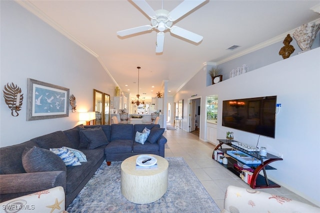 living room with ceiling fan, light tile patterned flooring, ornamental molding, and high vaulted ceiling