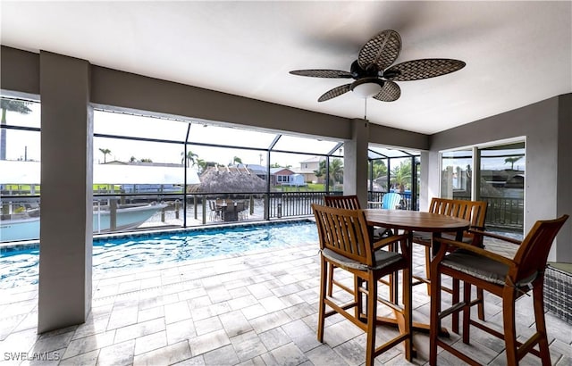 view of pool with ceiling fan