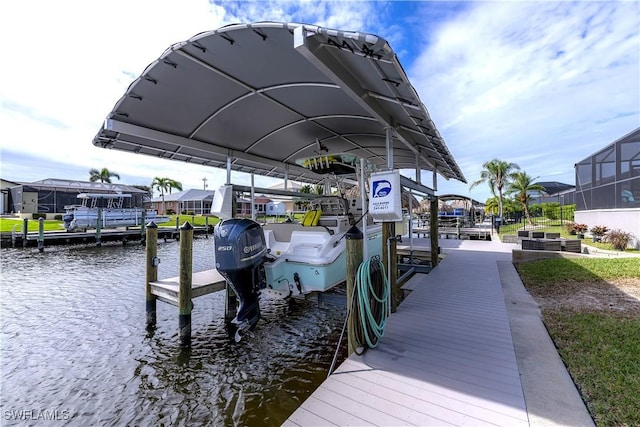 dock area with a water view