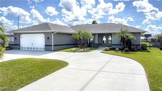 ranch-style home featuring a front yard and a garage