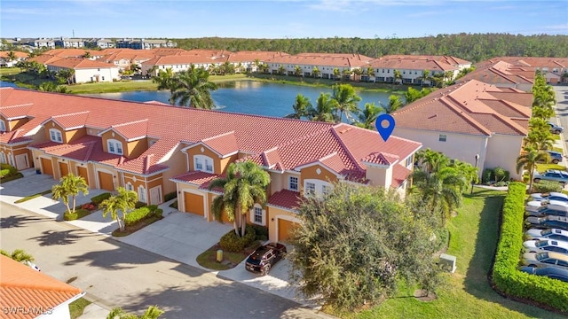 drone / aerial view featuring a water view