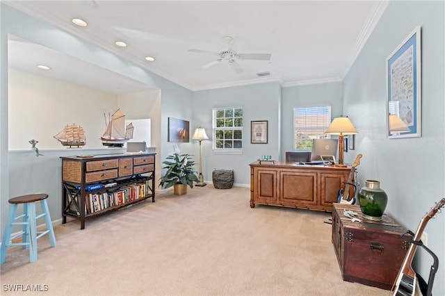 carpeted home office with ceiling fan and ornamental molding