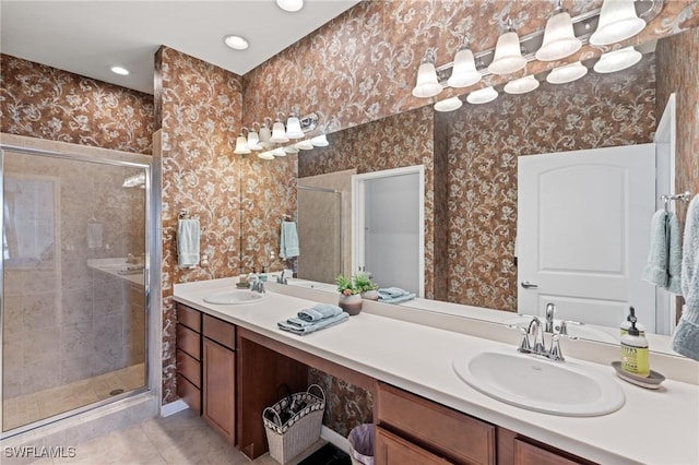 bathroom with vanity, tile patterned floors, and walk in shower