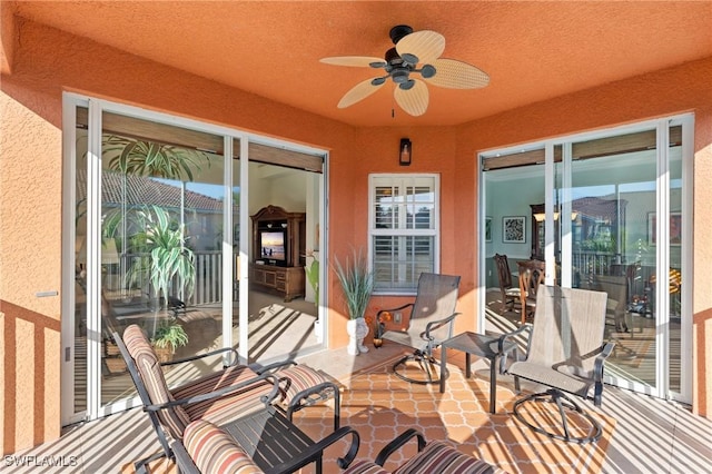 view of patio / terrace featuring ceiling fan