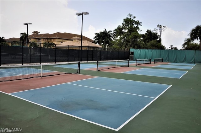 view of tennis court with basketball court