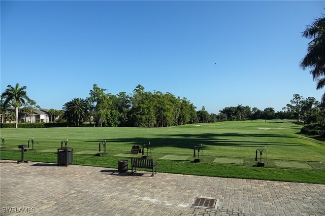 view of home's community featuring a yard