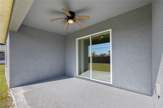 view of patio / terrace featuring ceiling fan