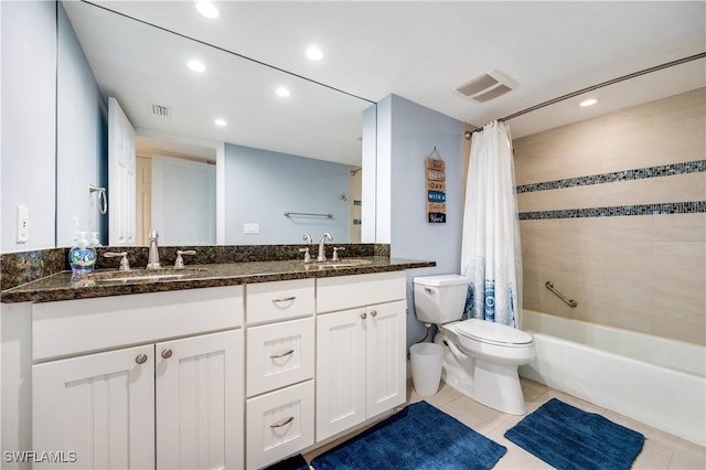 bathroom featuring tile patterned flooring, shower / bathtub combination with curtain, visible vents, and a sink