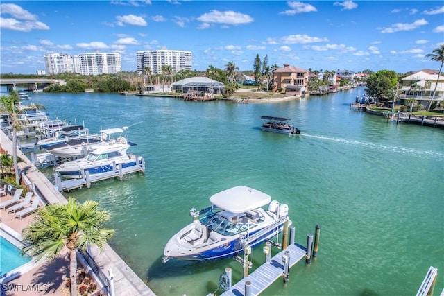 view of water feature with a boat dock and a view of city