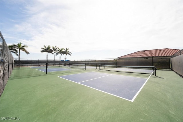 view of tennis court with basketball court