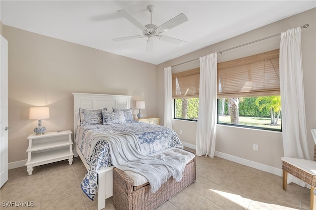 bedroom featuring ceiling fan and light tile patterned floors