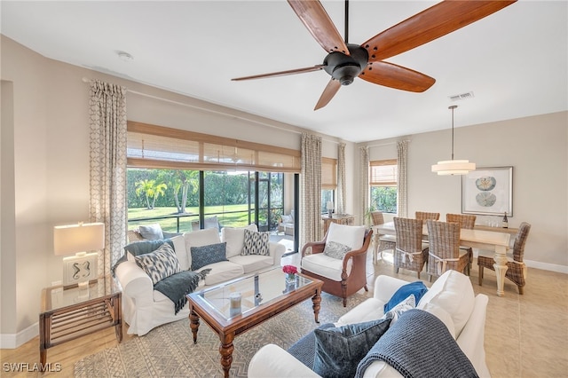 living room featuring ceiling fan