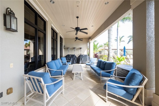 view of patio / terrace featuring an outdoor living space and ceiling fan