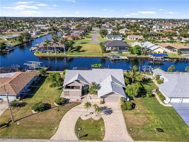 drone / aerial view featuring a water view