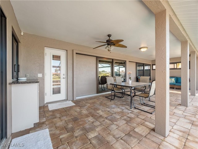 view of patio / terrace featuring ceiling fan and area for grilling