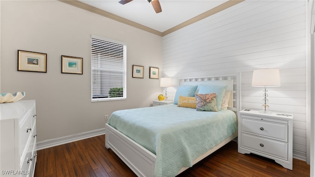 bedroom featuring ceiling fan, dark hardwood / wood-style flooring, crown molding, and multiple windows